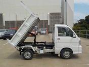 It is a picture of the white daihatsu hijet  dump in 1999,First Photo Stock No.Y038116