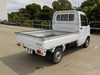 It is a picture of the white suzuki carry truck in 2005,Sub Photo 2 Stock No.Y038207
