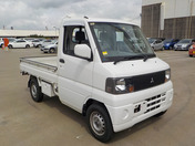 It is a picture of the white mitsubishi minicab truck in 2005,First Photo Stock No.Y038274