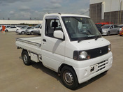 It is a picture of the white mitsubishi minicab truck in 2004,First Photo Stock No.Y038326