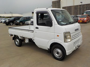 It is a picture of the white suzuki carry truck in 2008,First Photo Stock No.Y038757