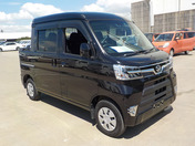 It is a picture of the black daihatsu hijet deck van in 2020,First Photo Stock No.Y039121