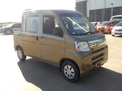 It is a picture of the khaki daihatsu hijet deck van in 2017,First Photo Stock No.Y039355