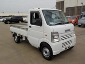 It is a picture of the white suzuki carry truck in 2009,First Photo Stock No.Y039779