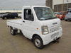 It is a picture of the white suzuki carry truck in 2009,Sub Photo 0 Stock No.Y039780