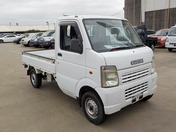 It is a picture of the white suzuki carry truck in 2005,First Photo Stock No.Y039865