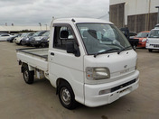 It is a picture of the white daihatsu hijet truck in 2001,First Photo Stock No.Y039880