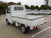 It is a picture of the white suzuki carry truck in 2004,Sub Photo 2 Stock No.Y039971