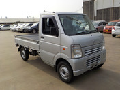It is a picture of the silver suzuki carry truck in 2010,First Photo Stock No.Y040050