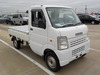 It is a picture of the white suzuki carry truck in 2009,Sub Photo 0 Stock No.Y040051