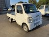 It is a picture of the white suzuki carry truck in 2006,Sub Photo 0 Stock No.Y040098