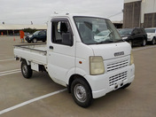 It is a picture of the white suzuki carry truck in 2003,First Photo Stock No.Y040285