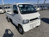 It is a picture of the white suzuki carry truck in 2001,Sub Photo 0 Stock No.Y040313