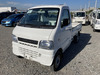 It is a picture of the white suzuki carry truck in 2001,Sub Photo 1 Stock No.Y040313