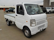 It is a picture of the white suzuki carry truck in 2009,First Photo Stock No.Y040363
