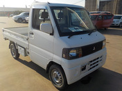 It is a picture of the white mitsubishi minicab truck in 2005,First Photo Stock No.Y040568