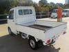 It is a picture of the white suzuki carry truck in 2003,Sub Photo 2 Stock No.Y040953