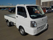 It is a picture of the white suzuki carry truck in 2015,First Photo Stock No.Y040983