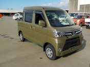 It is a picture of the khaki daihatsu hijet deck van in 2021,First Photo Stock No.Y041153