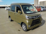 It is a picture of the khaki daihatsu hijet deck van in 2021,First Photo Stock No.Y041154