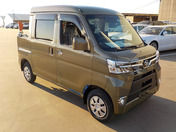 It is a picture of the khaki daihatsu hijet deck van in 2021,First Photo Stock No.Y041327