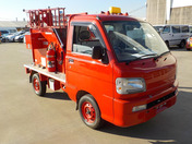 It is a picture of the red daihatsu hijet fire truck in 2003,First Photo Stock No.Y042095