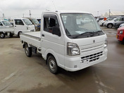 It is a picture of the white suzuki carry truck in 2014,First Photo Stock No.Y042456