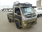 It is a picture of the  khaki  daihatsu hijet jumbo in 2021,First Photo Stock No.Y042716