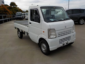 It is a picture of the white suzuki carry truck in 2010,First Photo Stock No.Y042969