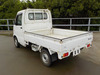 It is a picture of the white suzuki carry truck in 2002,Sub Photo 2 Stock No.Y043250
