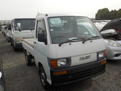 It is a picture of the white daihatsu hijet truck in 1997,First Photo Stock No.Y043416