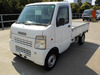 It is a picture of the white suzuki carry truck in 2004,Sub Photo 1 Stock No.Y044023