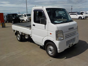 It is a picture of the white suzuki carry truck in 2002,First Photo Stock No.Y044147