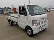 It is a picture of the white suzuki carry truck in 2008,First Photo Stock No.Y044362
