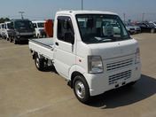 It is a picture of the white suzuki carry truck in 2012,First Photo Stock No.Y044521