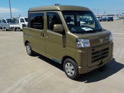 It is a picture of the khaki daihatsu hijet deck van in 2022,First Photo Stock No.Y044623