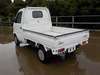 It is a picture of the white suzuki carry truck in 2002,Sub Photo 2 Stock No.Y045063