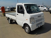 It is a picture of the white suzuki carry truck in 2008,First Photo Stock No.Y045331