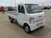 It is a picture of the white suzuki carry truck in 2009,First Photo Stock No.Y045692