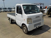 It is a picture of the white suzuki carry truck in 2006,First Photo Stock No.Y045973