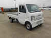 It is a picture of the white suzuki carry truck in 2002,Sub Photo 0 Stock No.Y046212