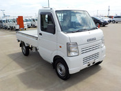 It is a picture of the white suzuki carry truck in 2003,First Photo Stock No.Y046305