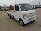 It is a picture of the white suzuki carry truck in 2009,First Photo Stock No.Y046497