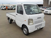 It is a picture of the white suzuki carry truck in 2007,First Photo Stock No.Y047086