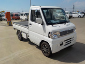 It is a picture of the white mitsubishi minicab truck in 2006,First Photo Stock No.Y047227