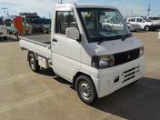 It is a picture of the white mitsubishi minicab truck in 2005,First Photo Stock No.Y047744