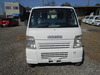 It is a picture of the white suzuki carry truck in 2004,Sub Photo 1 Stock No.Y048358