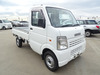It is a picture of the white suzuki carry truck in 2004,Sub Photo 0 Stock No.Y048459