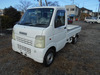 It is a picture of the white suzuki carry truck in 2002,Sub Photo 2 Stock No.Y048573