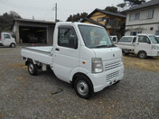 It is a picture of the white suzuki carry truck in 2011,First Photo Stock No.Y048590